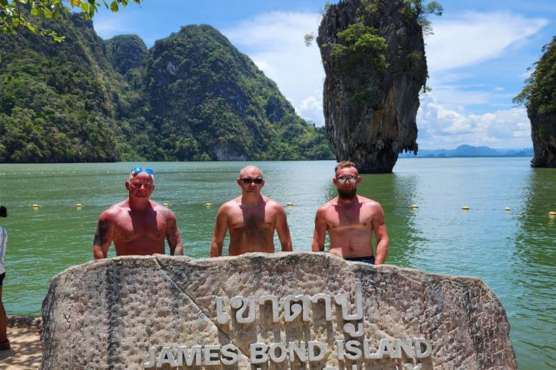 Tourists exploring the limestone caves of Phang Nga Bay, one of the highlights of a James Bond Tour