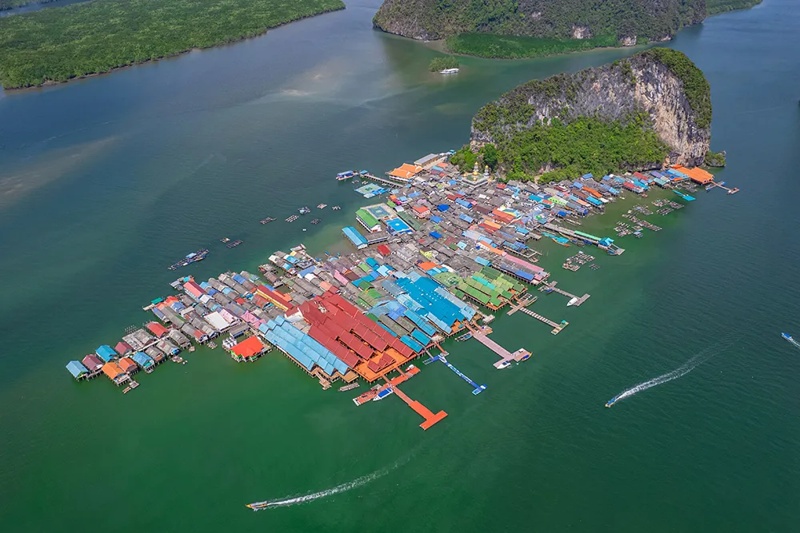 Aerial view of the floating village on Hong Island, Phuket, surrounded by green islands and clear wa