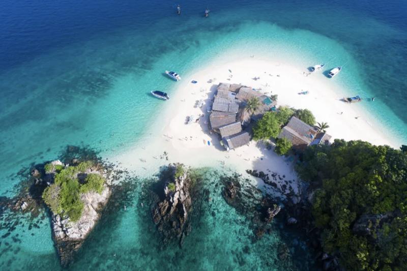 Pristine beaches on Phi Phi Island with crystal clear water and lush greenery.