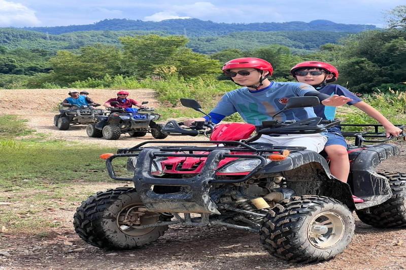 Experience the thrill of ATV riding in Thailand, navigating rugged terrains and exploring scenic lan