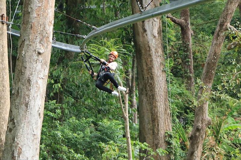 Experience a thrilling zip line adventure while rafting through lush forests and nature.