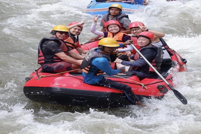 Dive into an exciting white-water rafting adventure with friends and family through river rapids.
