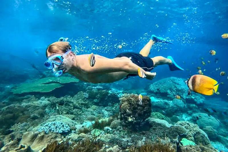 Explore the vibrant underwater world on a snorkeling adventure at Koh Racha Yai Island.