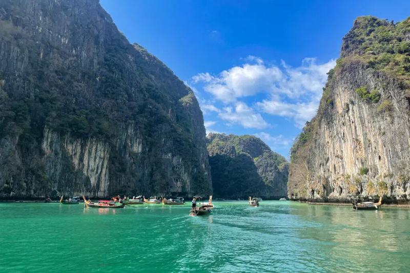 Entrance to Pileh Lagoon in Phi Phi Islands, Thailand, showcasing dramatic limestone cliffs and vibr