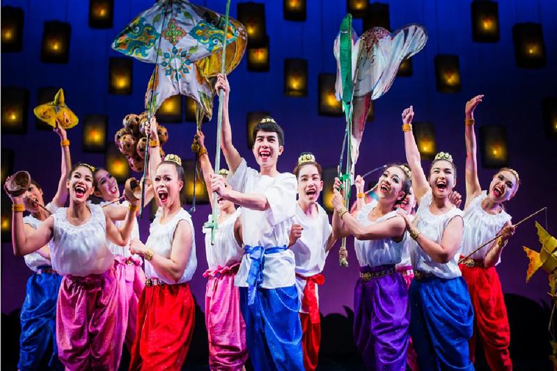 A lively cultural dance performance with colorful costumes at Phuket Fantasea.